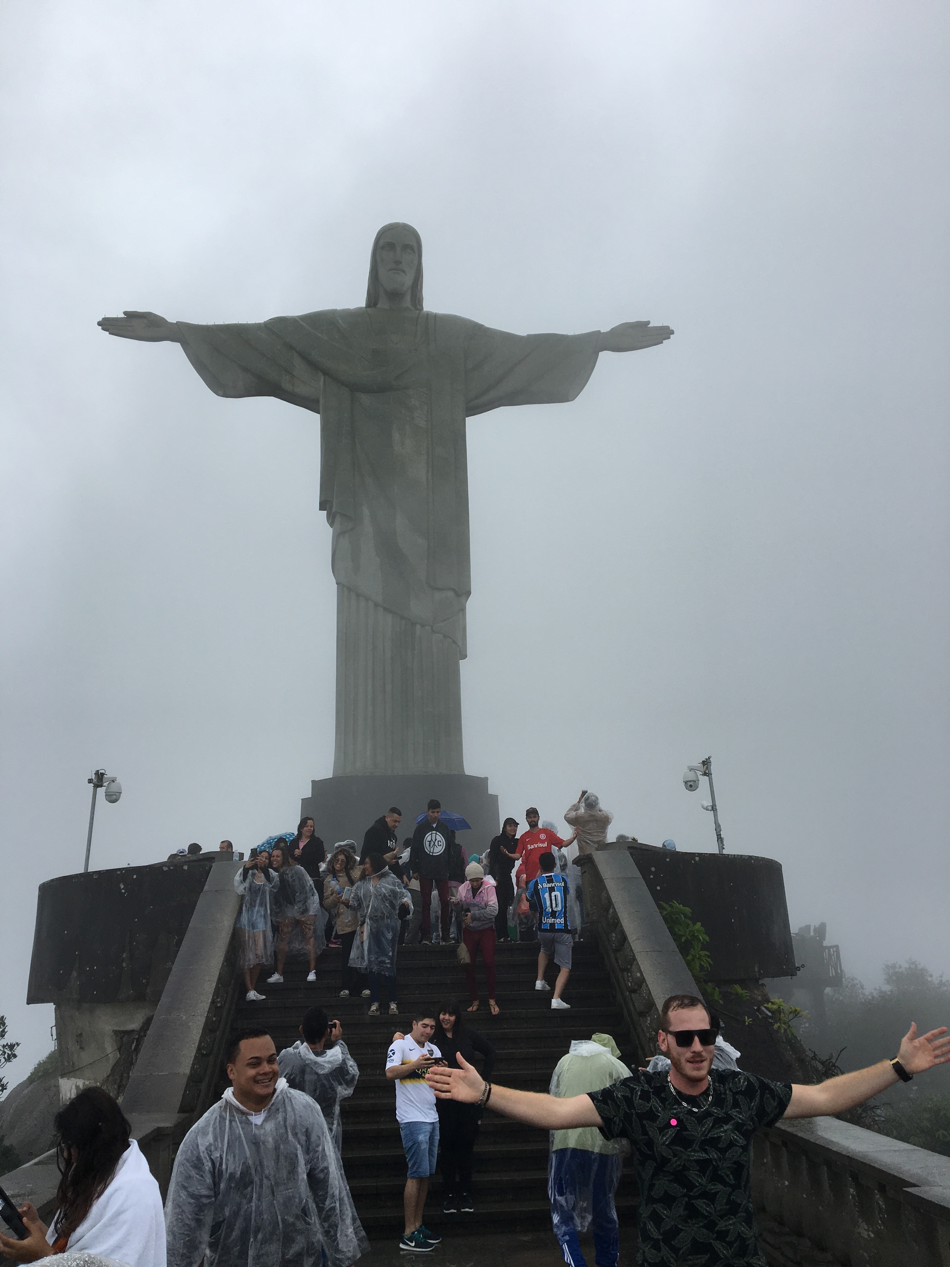 Selfie takers in front of the Cristo Redentor.